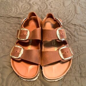 Birkenstock’s cognac color size 38 (7-7.5)